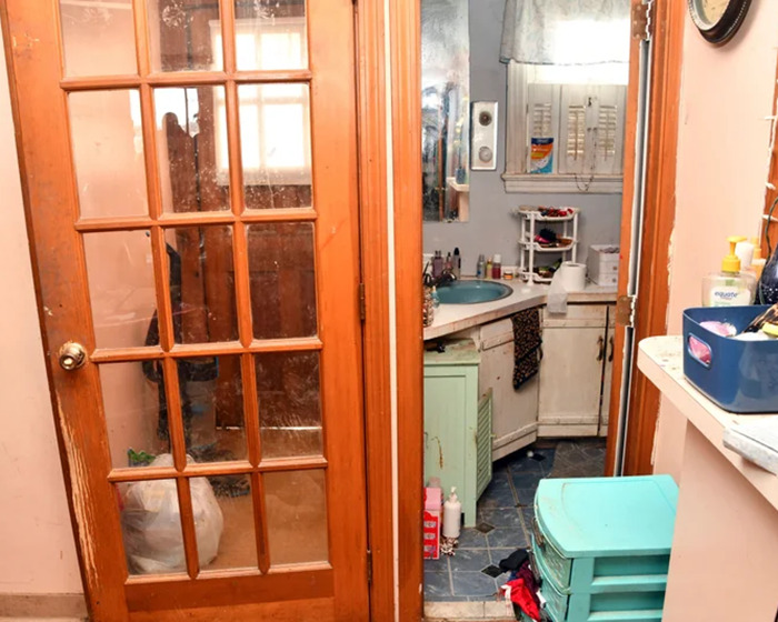 Small, cluttered bathroom signifying captivity. Small, cluttered bathroom signifying captivity.