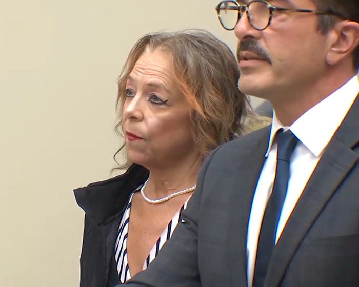 Stepmom in court, wearing striped outfit, related to man held captive for 20 years breaking silence. Stepmom in court, wearing striped outfit, related to man held captive for 20 years breaking silence.