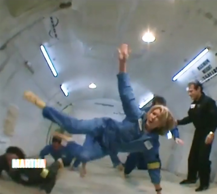 Martha Stewart in a blue jumpsuit, playfully floating in zero gravity, referencing Blue Origin astronauts. Martha Stewart in a blue jumpsuit, playfully floating in zero gravity, referencing Blue Origin astronauts.