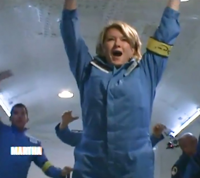 Martha Stewart in zero-gravity, wearing a blue jumpsuit, playfully mimics Blue Origin astronauts. Martha Stewart in zero-gravity, wearing a blue jumpsuit, playfully mimics Blue Origin astronauts.