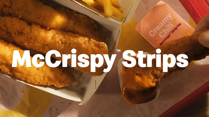 Chicken strips at McDonald's with fries and creamy chili dip.