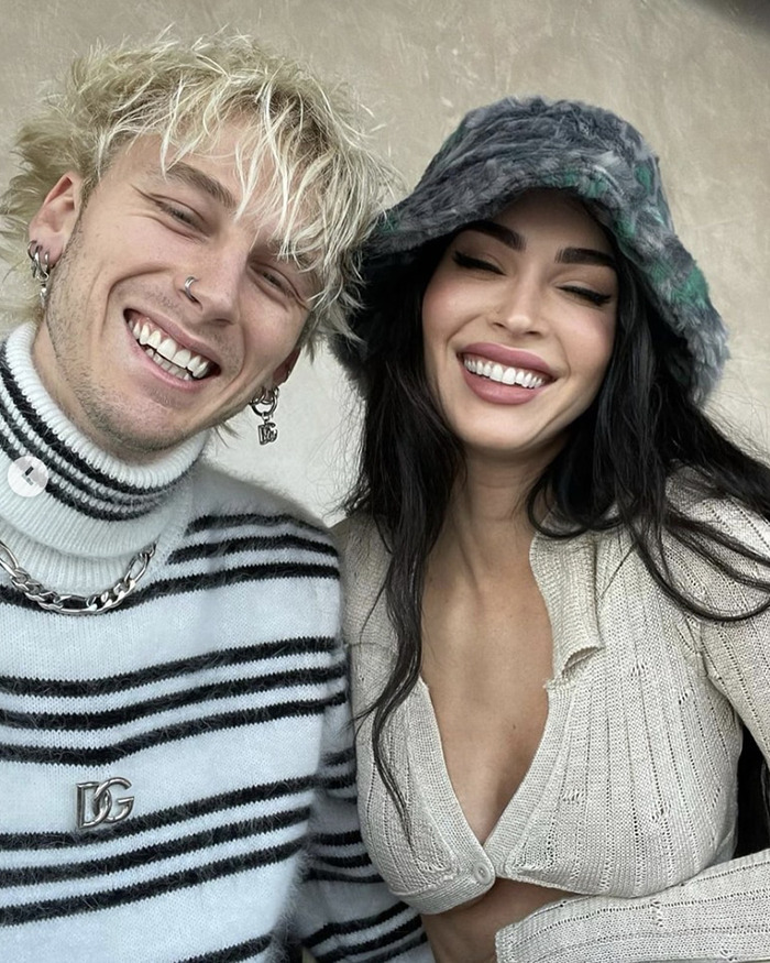 Machine Gun Kelly and Megan Fox smiling, addressing viral baby name confusion. Machine Gun Kelly and Megan Fox smiling, addressing viral baby name confusion.