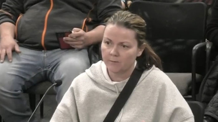 Parent expressing concern at meeting about explicit school survey questions. Parent expressing concern at meeting about explicit school survey questions.