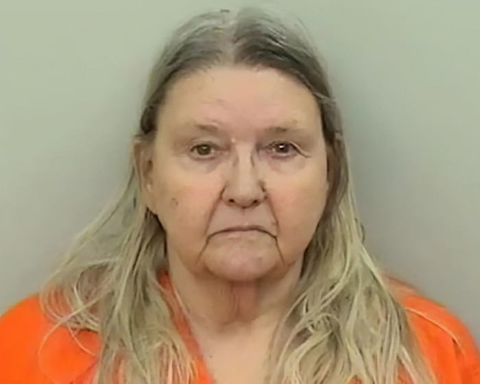 Elderly woman in orange attire linked to newborn's 1968 case. Elderly woman in orange attire linked to newborn's 1968 case.