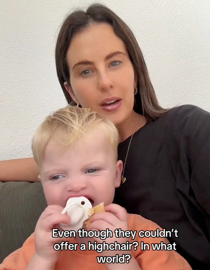 Mother and toddler at home, discussing restaurant incident and highchair issue. Mother and toddler at home, discussing restaurant incident and highchair issue.