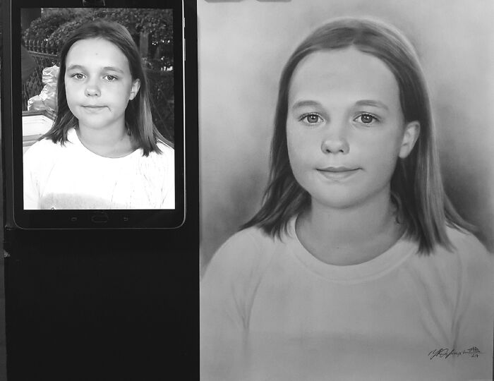 Hyper-realistic pencil portrait of a girl displayed next to her photo on a tablet.
