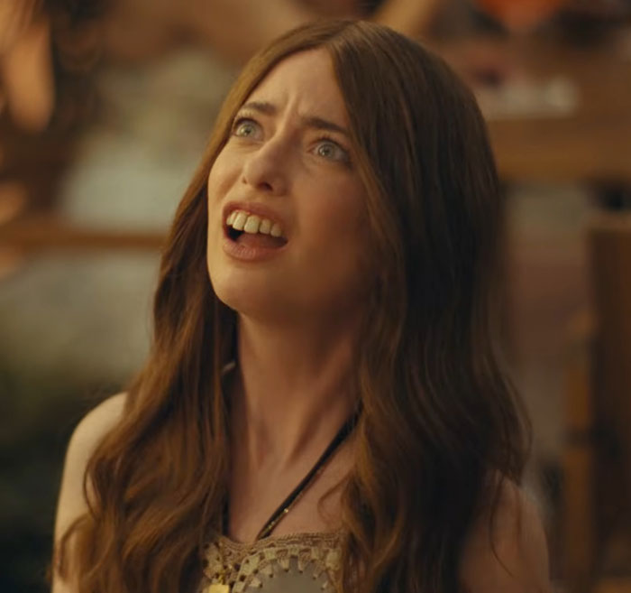 Aimee Lou Wood in The White Lotus, expressing surprise at a dinner scene. Aimee Lou Wood in The White Lotus, expressing surprise at a dinner scene.