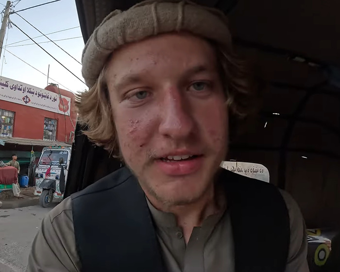 YouTuber in traditional attire, involved in Diet Coke stunt affecting isolated tribe, facing legal consequences. YouTuber in traditional attire, involved in Diet Coke stunt affecting isolated tribe, facing legal consequences.