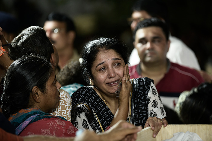 Family members mourning with grief and tears as horrifying viral video of mass tragedy killing 26 lives spreads online. Family members mourning with grief and tears as horrifying viral video of mass tragedy killing 26 lives spreads online.