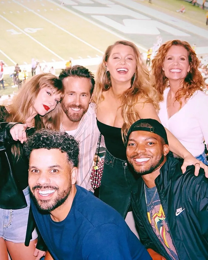 Group of friends posing at a football game, with key figures in discussions related to Taylor Swift and Blake Lively. Group of friends posing at a football game, with key figures in discussions related to Taylor Swift and Blake Lively.
