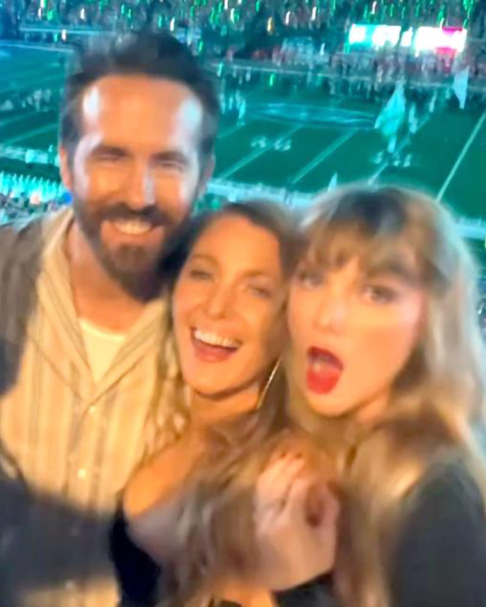 A group enjoying a lively moment at a sports event, emphasizing the drama surrounding Taylor Swift and friends. A group enjoying a lively moment at a sports event, emphasizing the drama surrounding Taylor Swift and friends.