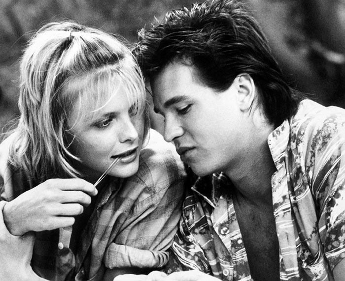 A couple sitting close together, sharing an intimate moment, highlighting the theme of loneliness despite past relationships. A couple sitting close together, sharing an intimate moment, highlighting the theme of loneliness despite past relationships.