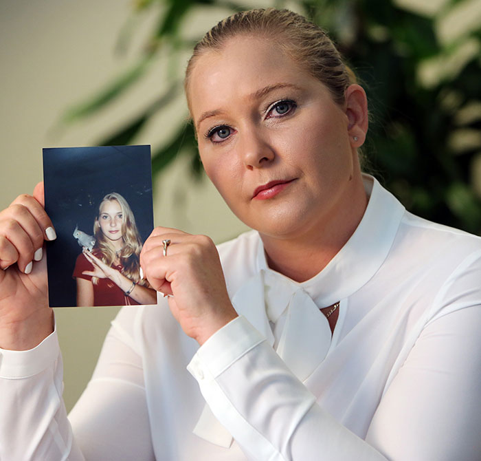 Woman holding a photo, expressing doubt as Virginia Giuffre’s lawyer questions claim of her taking her own life. Woman holding a photo, expressing doubt as Virginia Giuffre’s lawyer questions claim of her taking her own life.