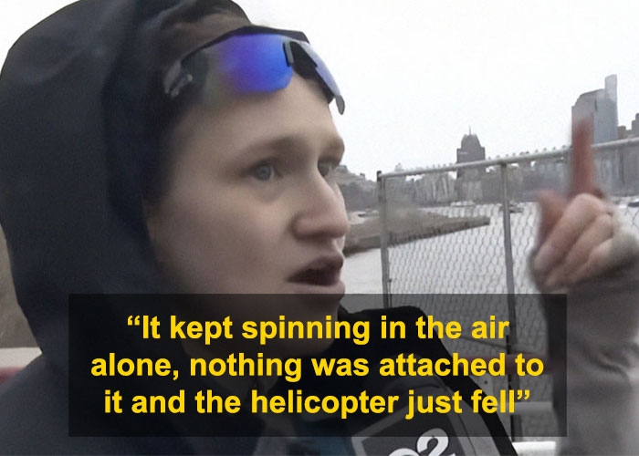 Witness recounts NYC helicopter crash, gestures near river with a dramatic expression, cityscape in background. Witness recounts NYC helicopter crash, gestures near river with a dramatic expression, cityscape in background.