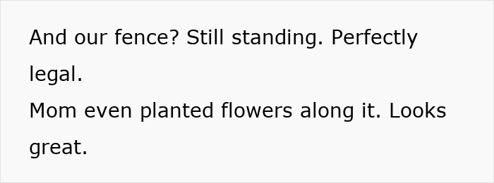 Fence still standing with flowers planted along it, showing a failed sabotage attempt by a neighbor.