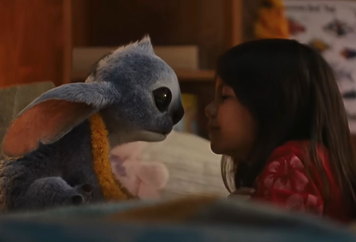 Disney fans react to live-action Lilo & Stitch character design change showing Stitch and young girl close together. Disney fans react to live-action Lilo & Stitch character design change showing Stitch and young girl close together.