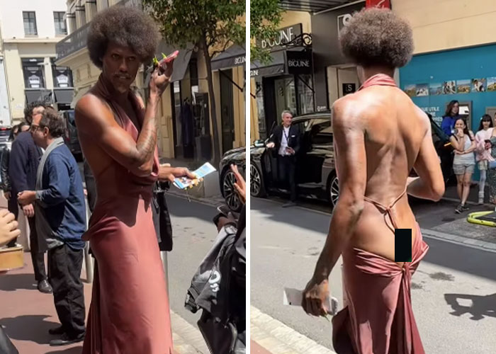 Person in a backless dress revealing backside on a street, breaking Cannes dress code to mass applause from onlookers. Person in a backless dress revealing backside on a street, breaking Cannes dress code to mass applause from onlookers.