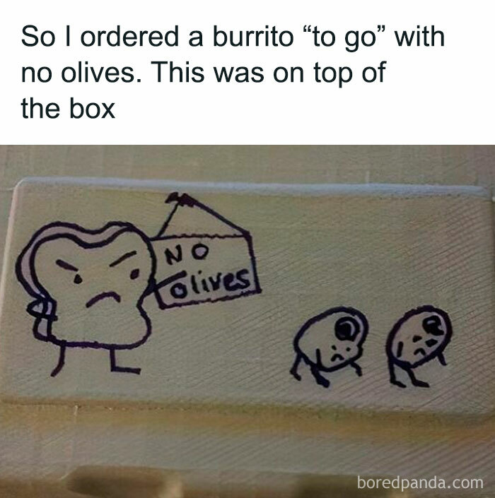 Takeout container with a funny hand-drawn meme showing a no olives sign, relatable hospitality work humor.