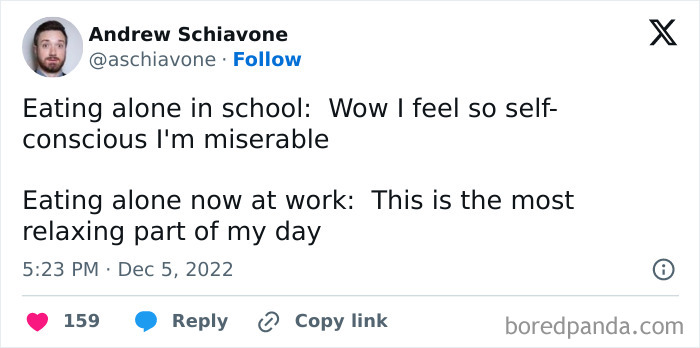 Tweet comparing feelings of eating alone at school versus work, illustrating relatable human experience memes.