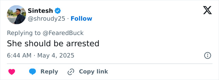 Screenshot of a tweet saying she should be arrested, related to racist woman who called a child a racial slur. Screenshot of a tweet saying she should be arrested, related to racist woman who called a child a racial slur.