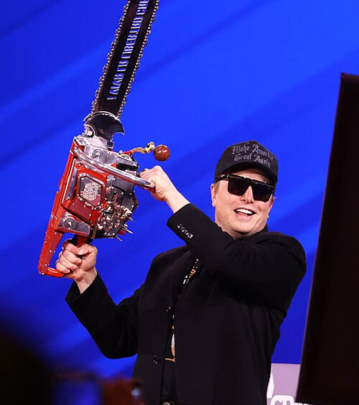 Man wearing sunglasses and a cap holding a large chainsaw, illustrating costly money-saving mistakes concept.