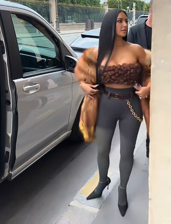 Woman in stylish outfit standing near an open car door during Lauren Sánchez bachelorette party with Katy Perry and Kim K. Woman in stylish outfit standing near an open car door during Lauren Sánchez bachelorette party with Katy Perry and Kim K.