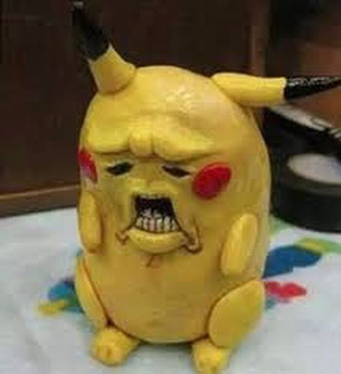 Distorted Pikachu figure with exaggerated facial features, creating a cursed image for a weird visual break.