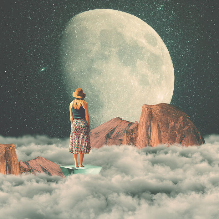 Woman standing on a geometric shape above clouds with rocky mountains and a large moon in surreal photo manipulation collage.