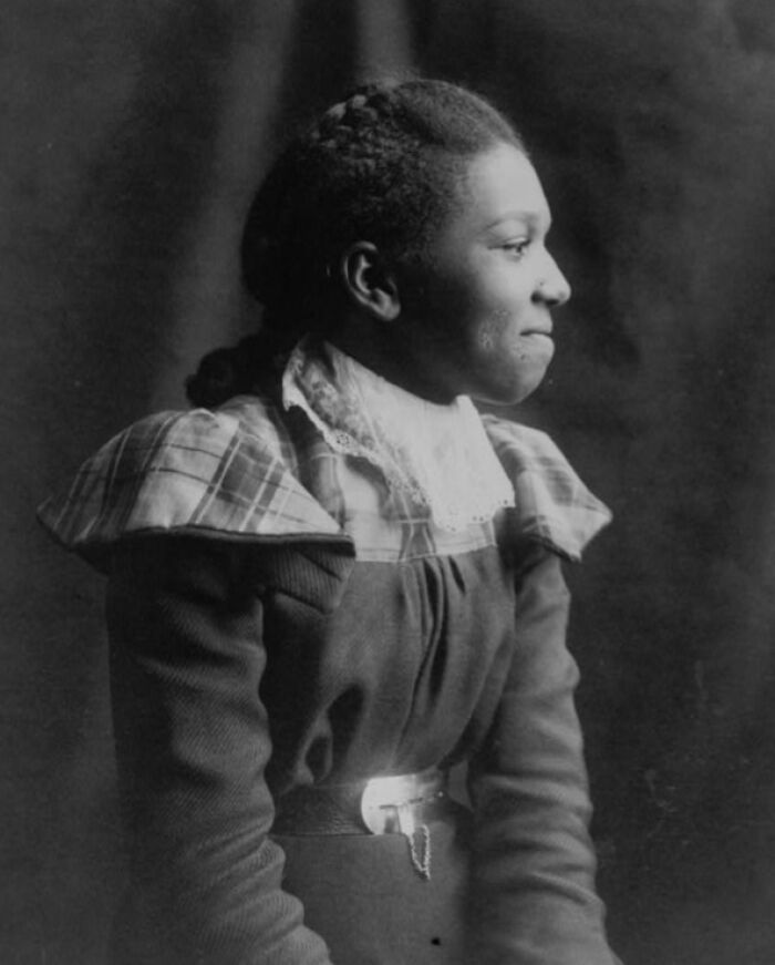 African American woman in historic clothing portrait from 1900 Paris Exposition capturing African American life.