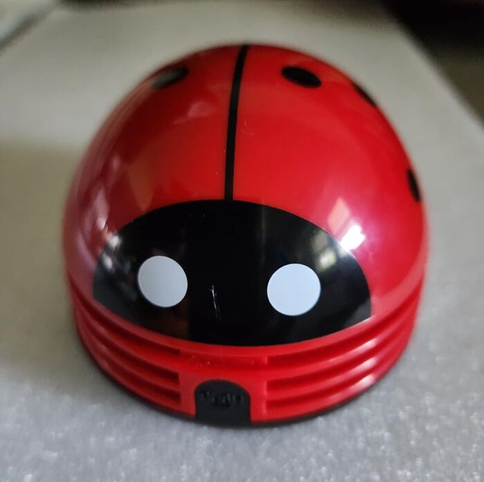 Red ladybug-shaped desk accessory, a cute find to brighten up your desk and create a Monday happy place.