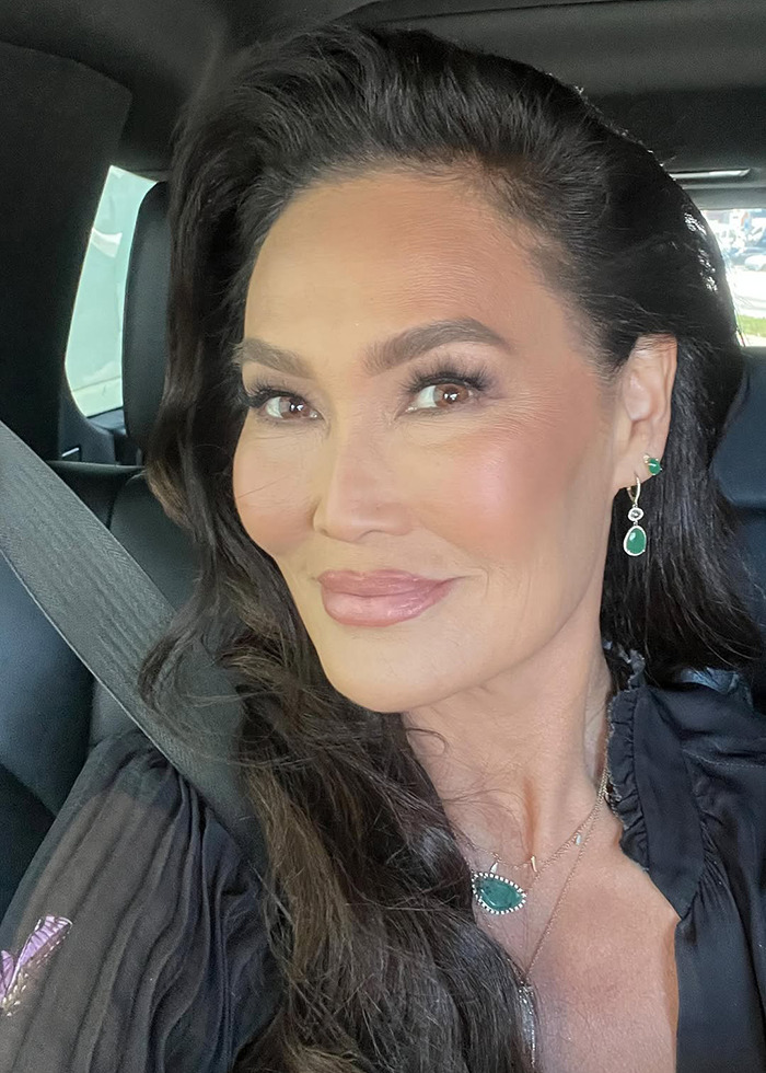 Tia Carrere close-up portrait with flawless skin and dark hair, showcasing her ageless beauty in natural light. Tia Carrere close-up portrait with flawless skin and dark hair, showcasing her ageless beauty in natural light.
