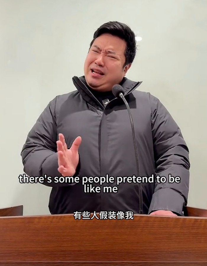 Chinese TikToker performing a viral impression of U.S. President while standing at a podium and speaking into a microphone. Chinese TikToker performing a viral impression of U.S. President while standing at a podium and speaking into a microphone.