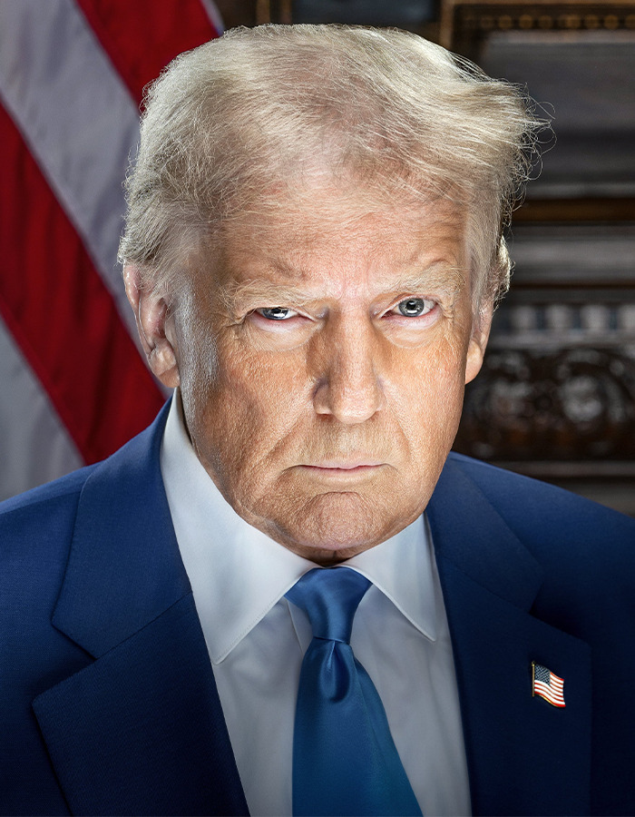Close-up of a man resembling Donald Trump wearing a blue suit and tie with an American flag pin and background. Close-up of a man resembling Donald Trump wearing a blue suit and tie with an American flag pin and background.