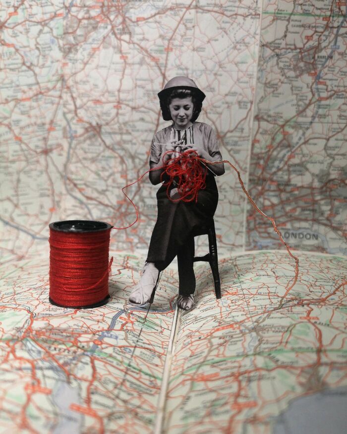 Black and white woman knitting with red yarn on an oversized spool, sitting on a detailed map, creative photo manipulation.