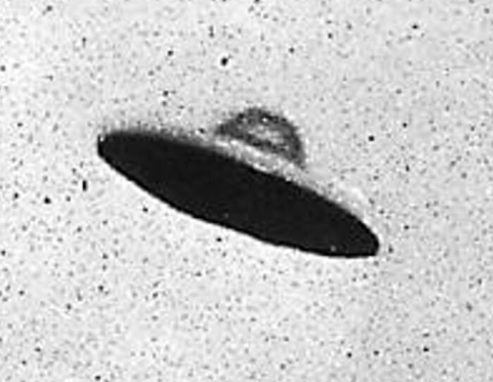 Black and white photo of a UFO sighting, illustrating bizarre historical events you won't believe happened.