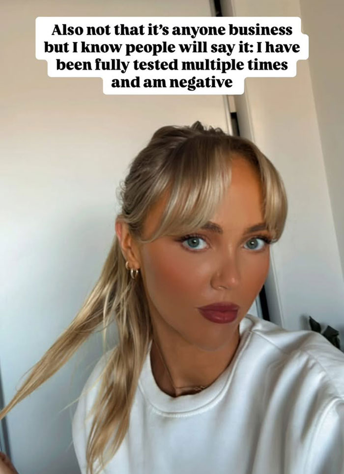 Annie Knight with blonde hair, wearing a white top, addressing health problems and hospital visit after sleeping with 583 men. Annie Knight with blonde hair, wearing a white top, addressing health problems and hospital visit after sleeping with 583 men.