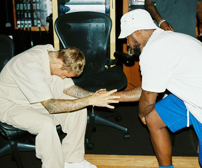 Justin Bieber and another man in a studio setting, highlighting Bieber finally breaking silence on Diddy victim rumors. Justin Bieber and another man in a studio setting, highlighting Bieber finally breaking silence on Diddy victim rumors.