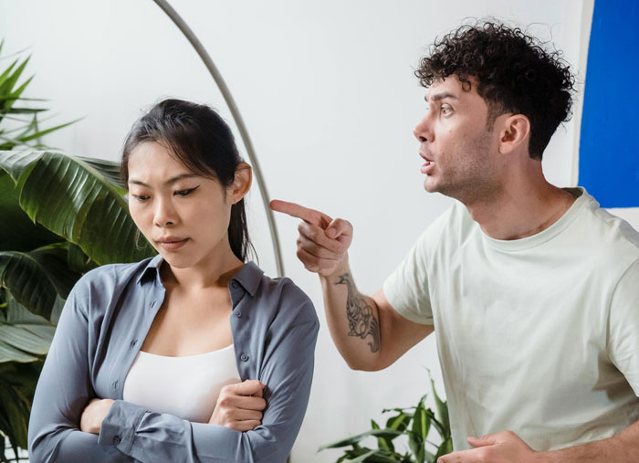 Man demanding his girlfriend remove tattoo honoring her late boyfriend, causing tension and emotional conflict. Man demanding his girlfriend remove tattoo honoring her late boyfriend, causing tension and emotional conflict.