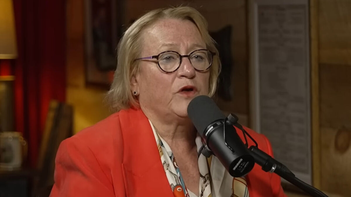 Former official in glasses discussing US secret $21 trillion underground city for the rich and powerful during interview.