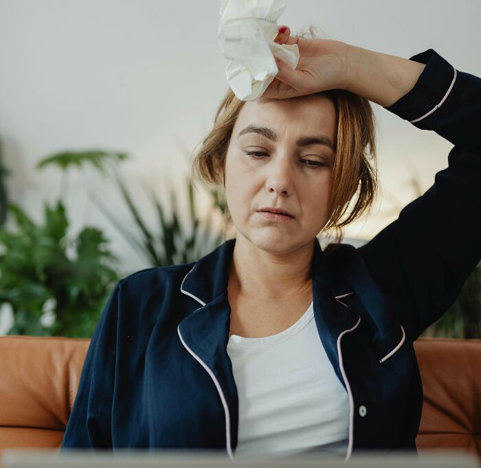 Woman feeling stressed and upset at home during a family trip conflict about boyfriends not counting as family Woman feeling stressed and upset at home during a family trip conflict about boyfriends not counting as family