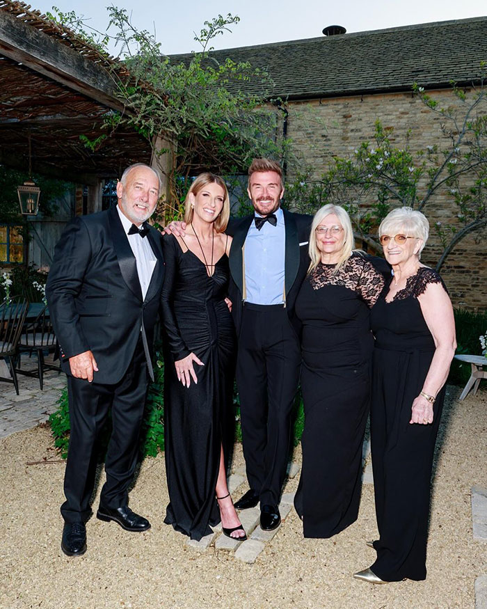 David Beckham posing with family members at an outdoor event amid major family feud during 50th birthday party. David Beckham posing with family members at an outdoor event amid major family feud during 50th birthday party.