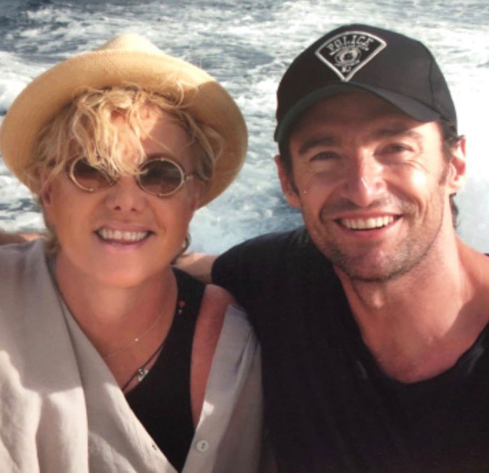 Deborra-Lee Furness and Hugh Jackman smiling on a boat, highlighting the journey of betrayal and divorce news. Deborra-Lee Furness and Hugh Jackman smiling on a boat, highlighting the journey of betrayal and divorce news.