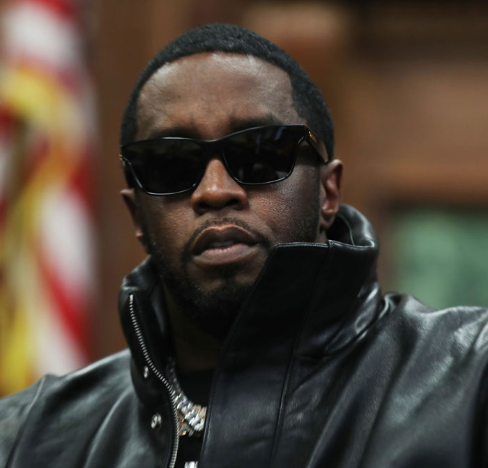 Diddy wearing sunglasses and a leather jacket, representing Diddy’s net worth plunge amid legal troubles.