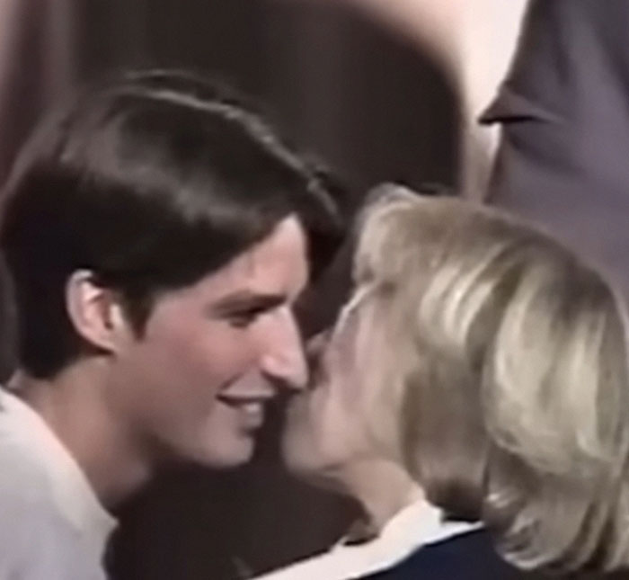 Lip reader analyzing French President Emmanuel Macron’s wife speaking closely after the shoving incident.