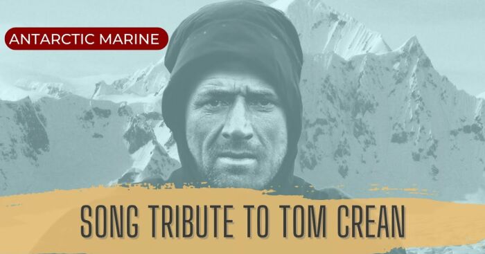 Portrait of a man in winter gear with snowy mountains in the background for Tom Crean movie tribute.