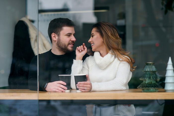 A man and woman having coffee together, illustrating tales of ultimatums and lost friendships between men and female friends.