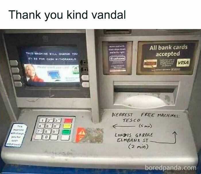ATM keypad with handwritten directions to nearest free cash machines by wholesome vandals improving streets.