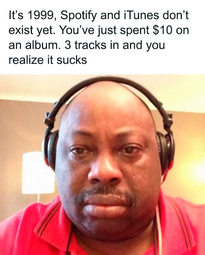 Man wearing headphones with a sad expression, representing memes encapsulating the human experience in music disappointment.
