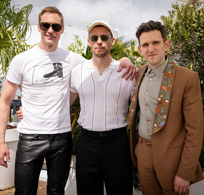 Three men posing outdoors, one wearing a Harry Potter star-themed outfit, related to x-rated gay film with graphic scenes. Three men posing outdoors, one wearing a Harry Potter star-themed outfit, related to x-rated gay film with graphic scenes.
