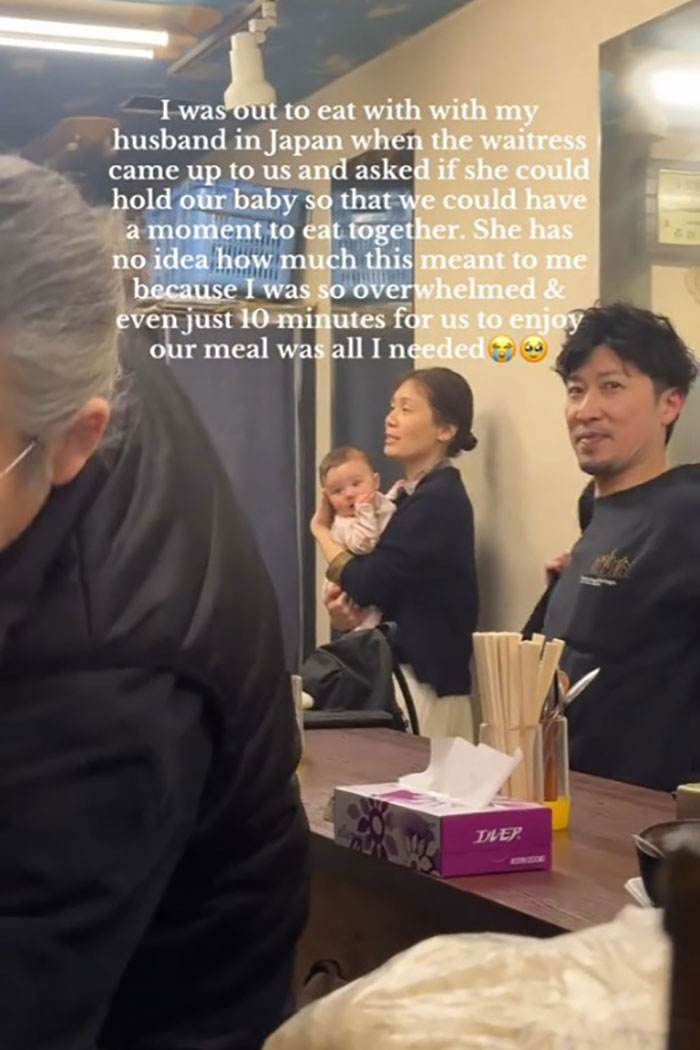 Japanese waitress goes viral for helping a traveling mom and dad by holding their baby during meal in Japan restaurant. Japanese waitress goes viral for helping a traveling mom and dad by holding their baby during meal in Japan restaurant.